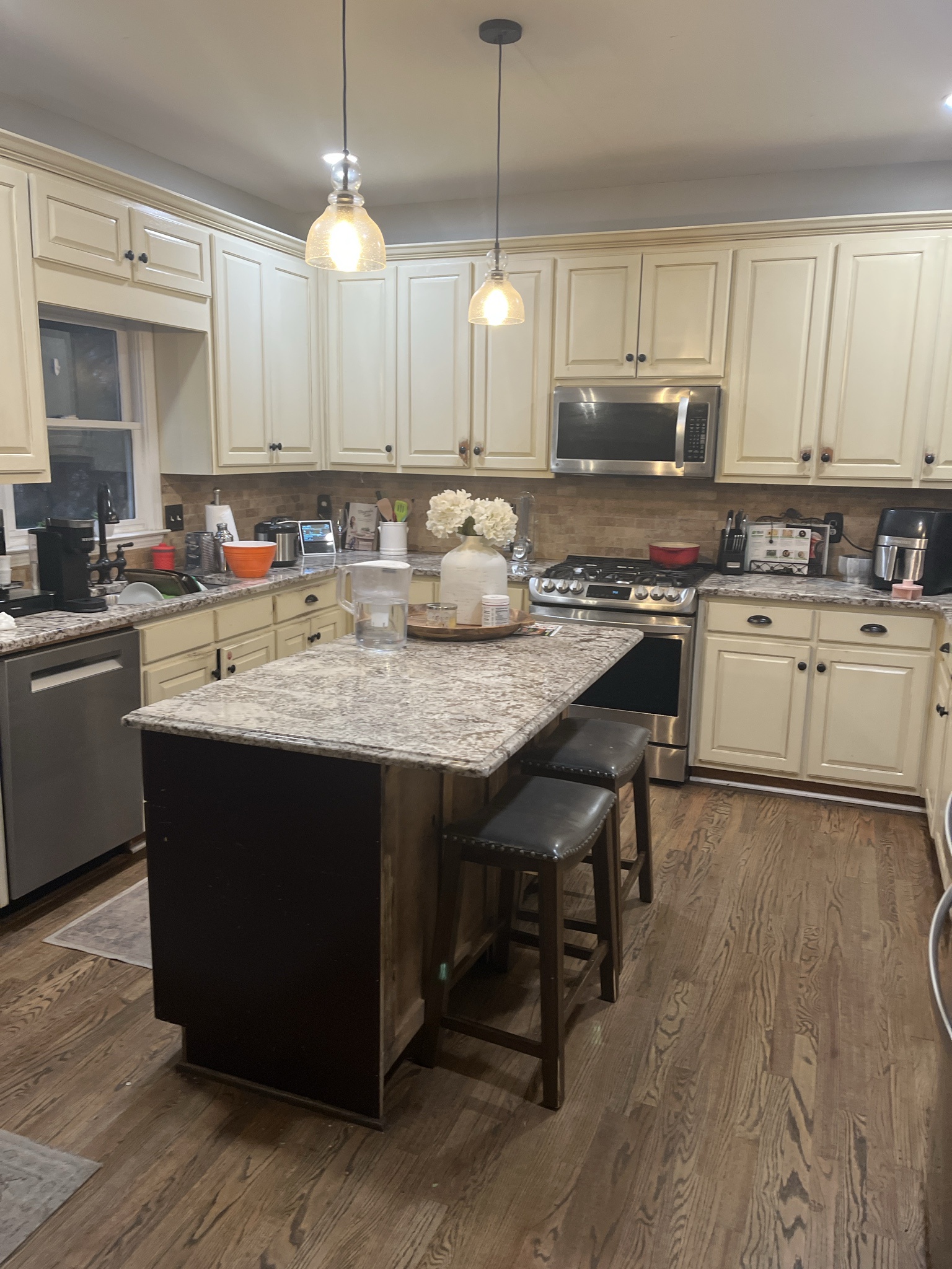 Progress Update: Kitchen Renovation Completed, Hardwood Floors Installed, and Basement Walls Finished!