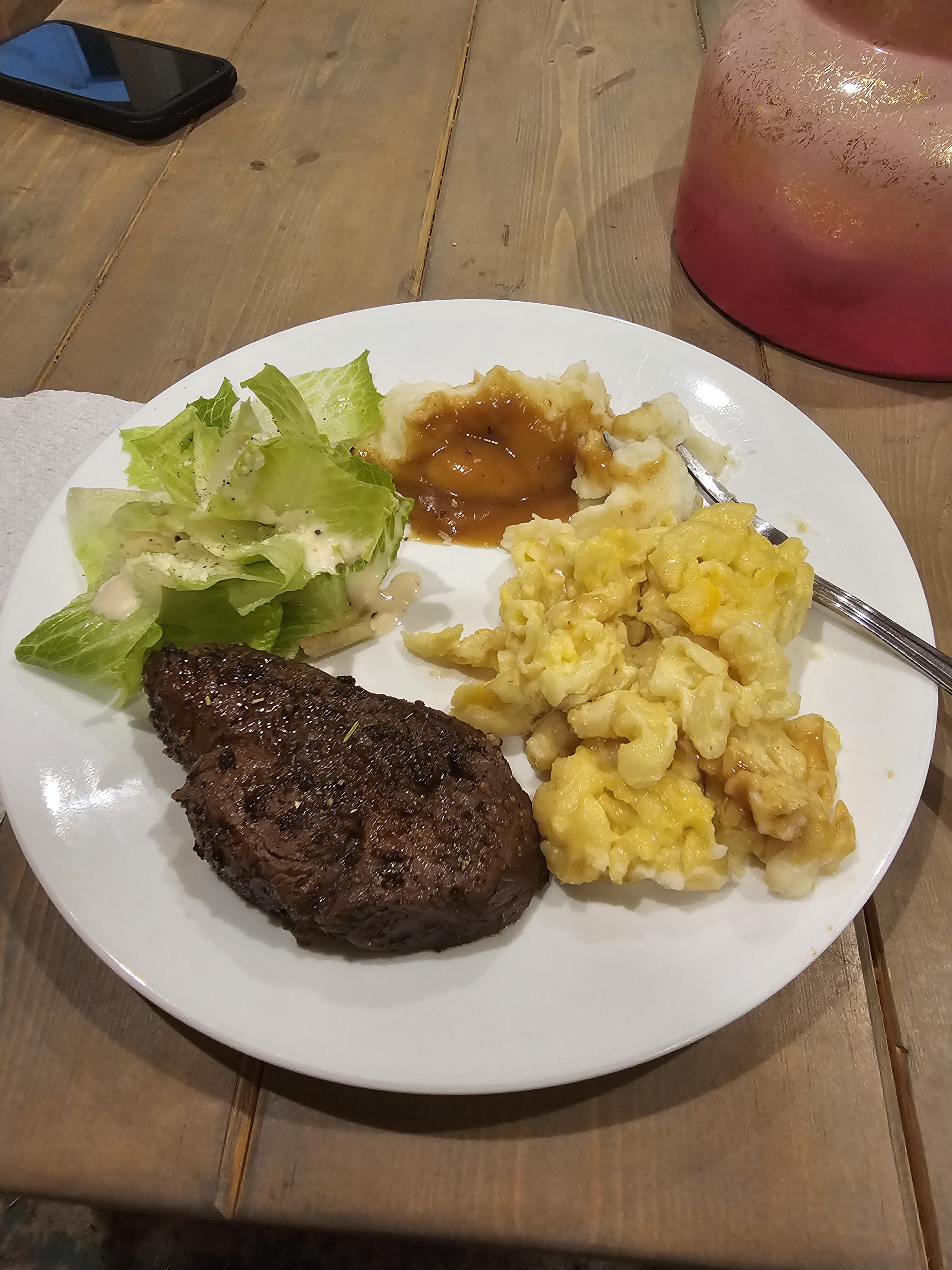 A Delicious Feast: Filet, Mac n Cheese, Mashed Potatoes, and Caesar Salad