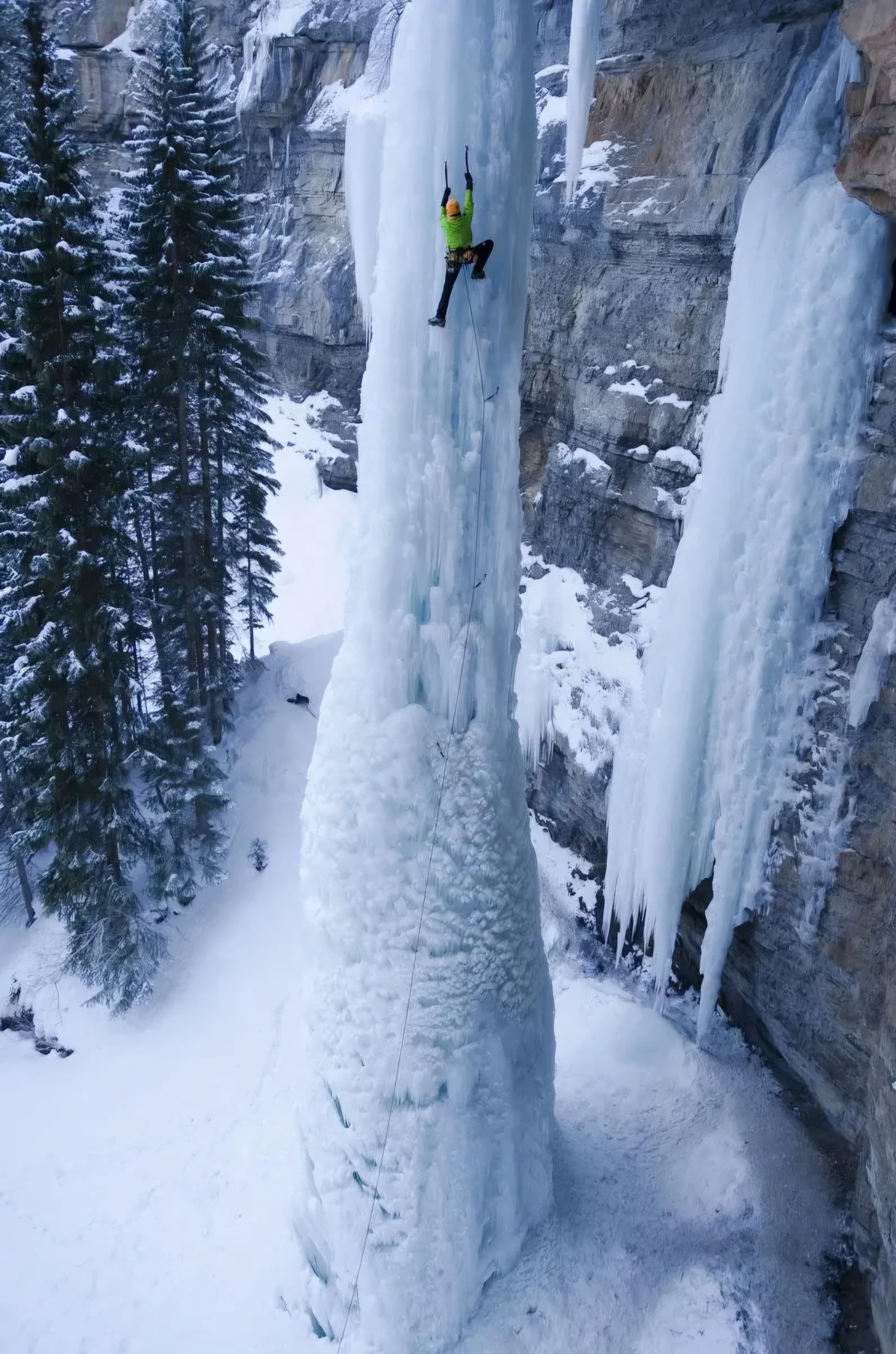 Scaling a frozen waterfall: impressive but absolutely terrifying!