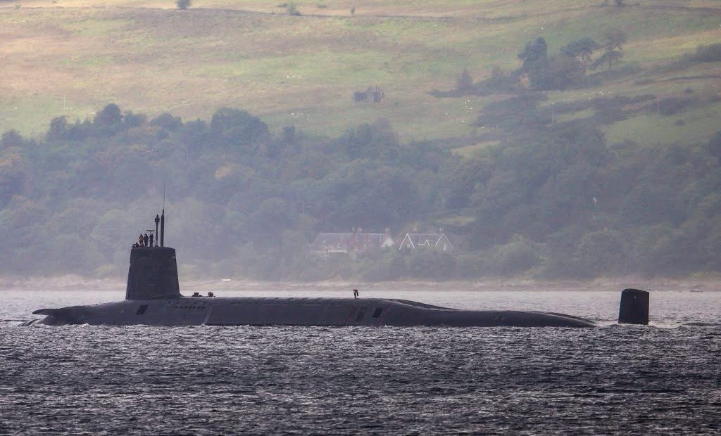 UK Royal Navy Vanguard class SSBN setting sail from Faslane, Scotland.