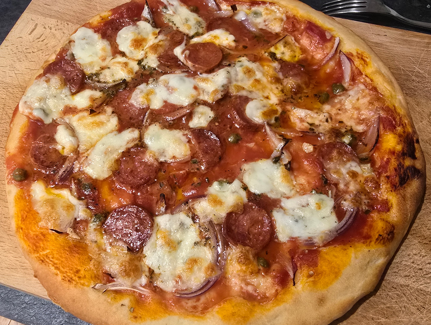 Delicious homemade pepperoni pizza straight from the oven