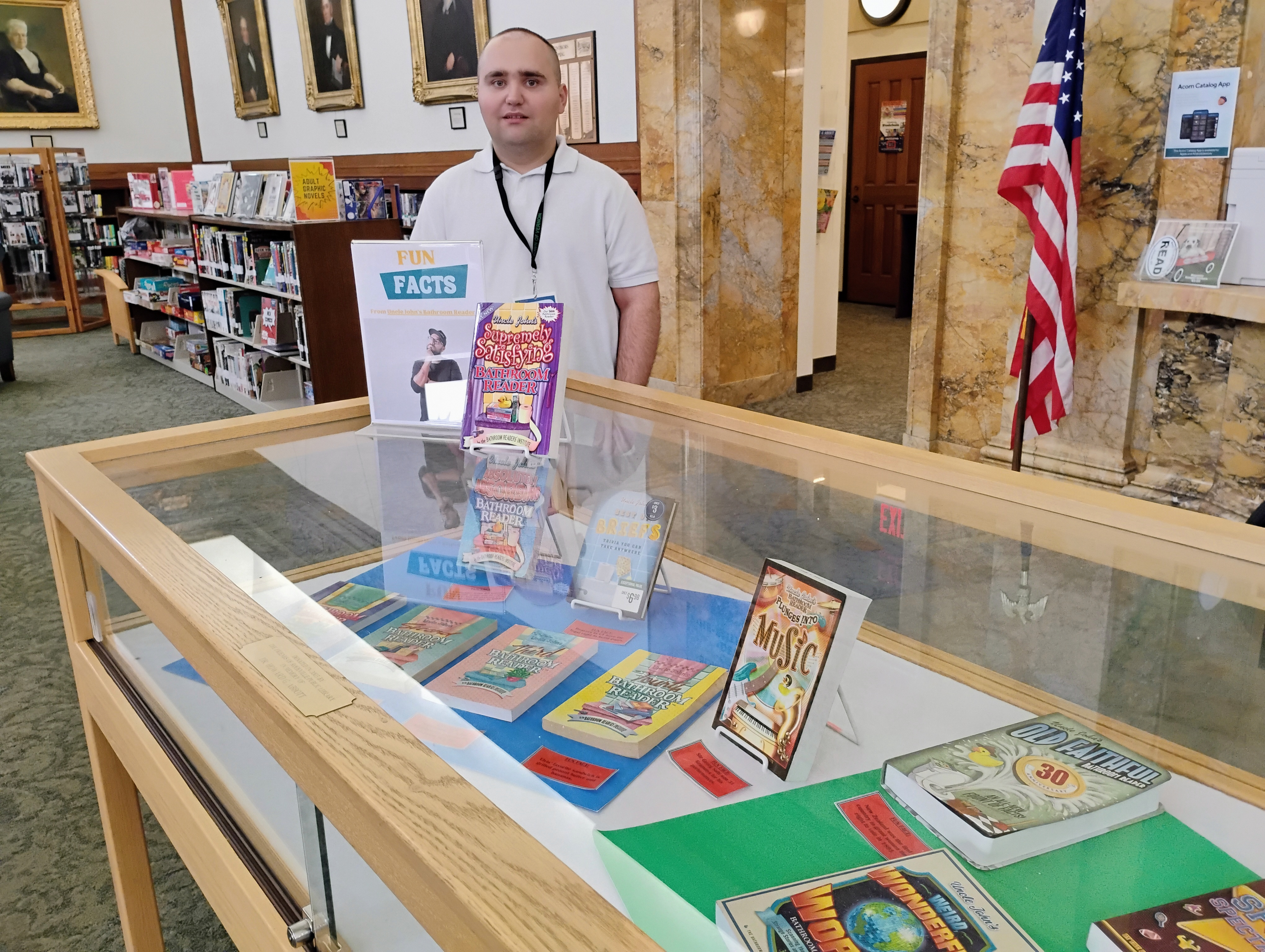 As an intern, I created a book display featuring Uncle John's Bathroom Reader at my local library