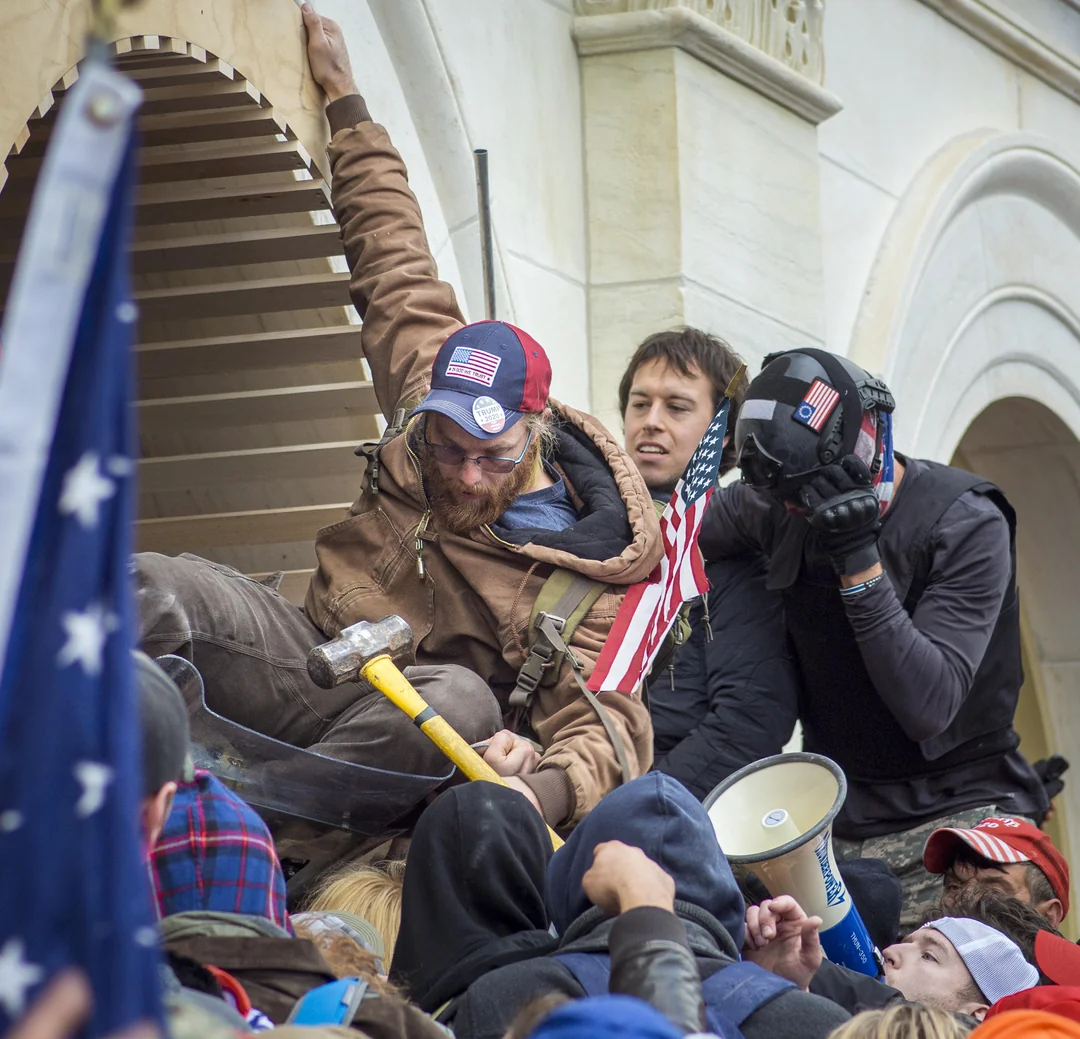 Chaos Unleashed: Insurrectionists Hand Off a Sledgehammer on January 6th, 2021