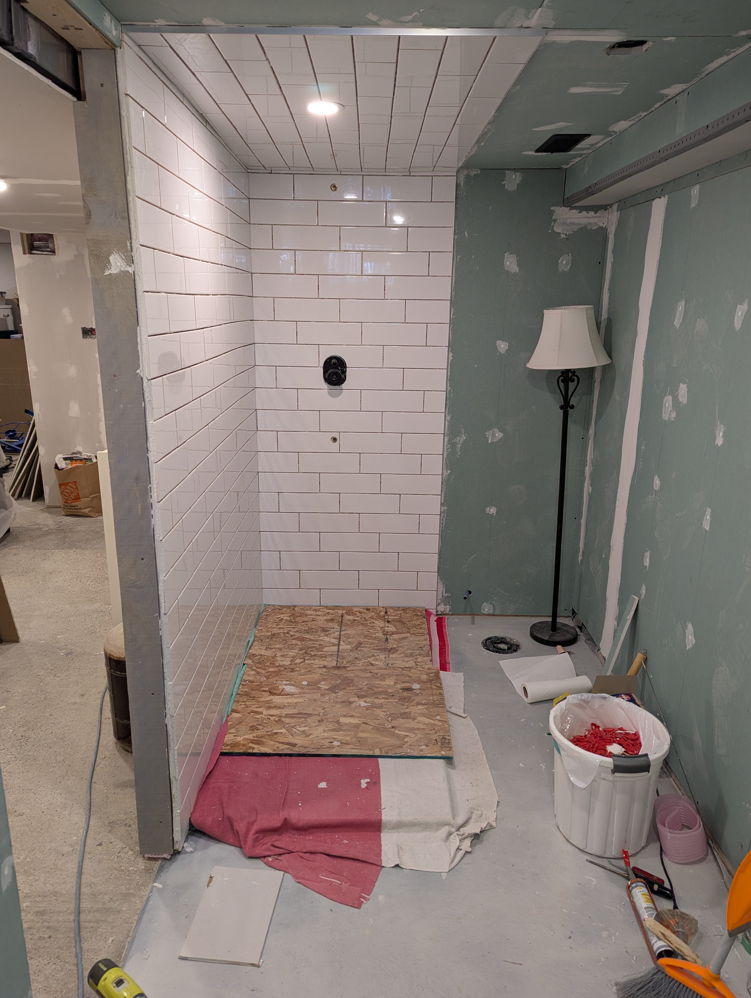 DIY Shower Project Update: Tiles are in, grout is next!