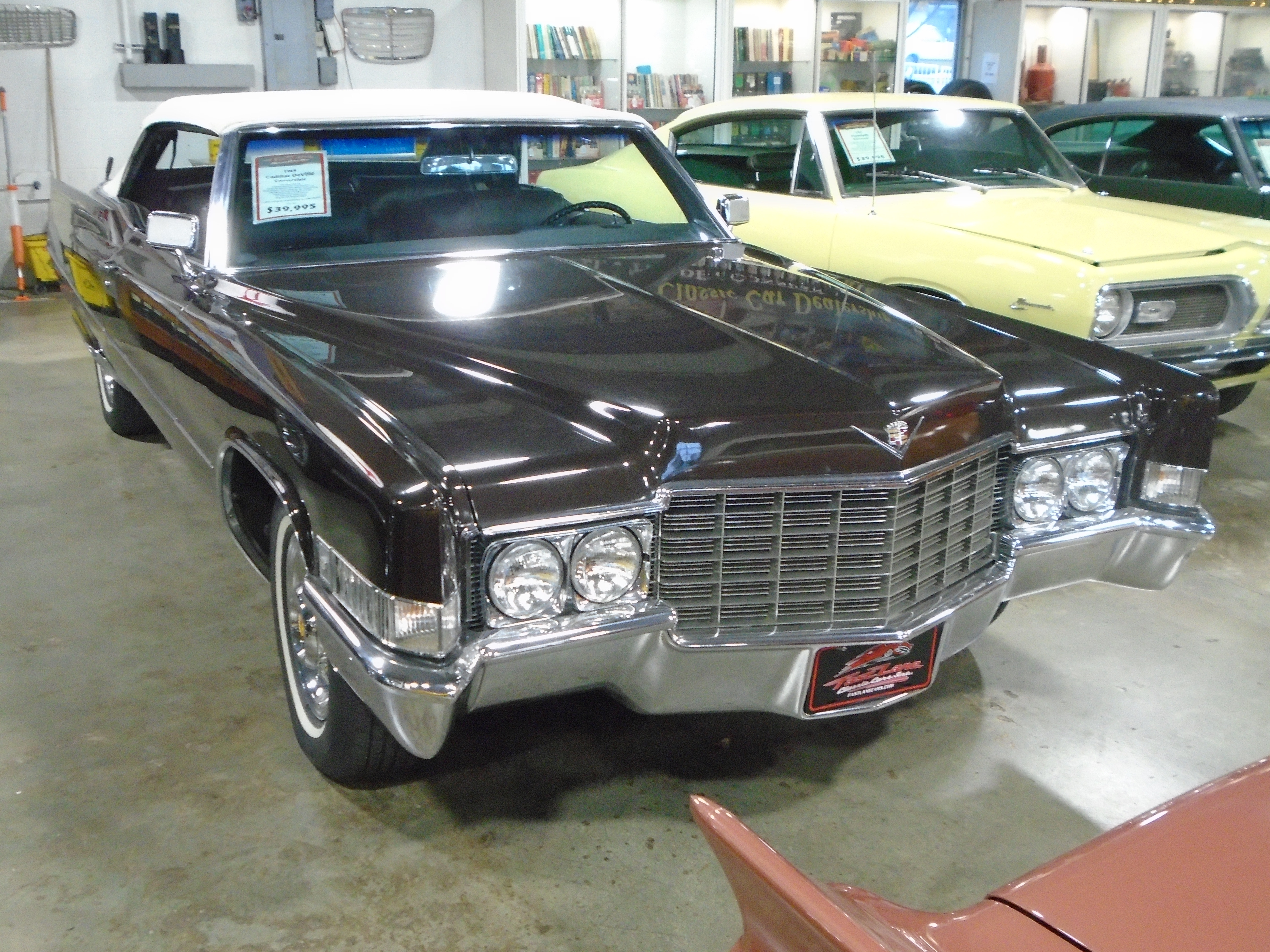 Behold the stunning 1969 Cadillac DeVille Convertible Coupe!