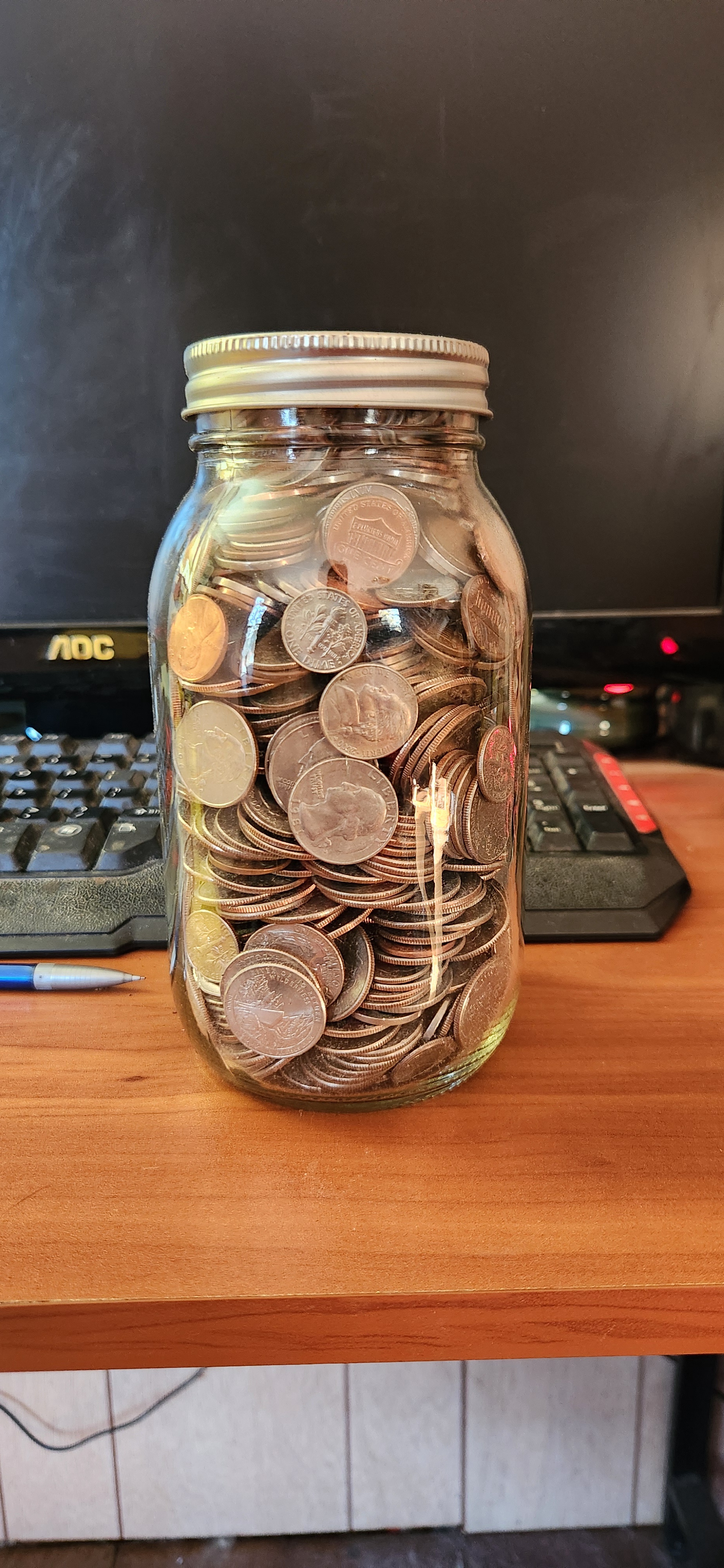 Guess the Cash: How Much is in This Jar?
