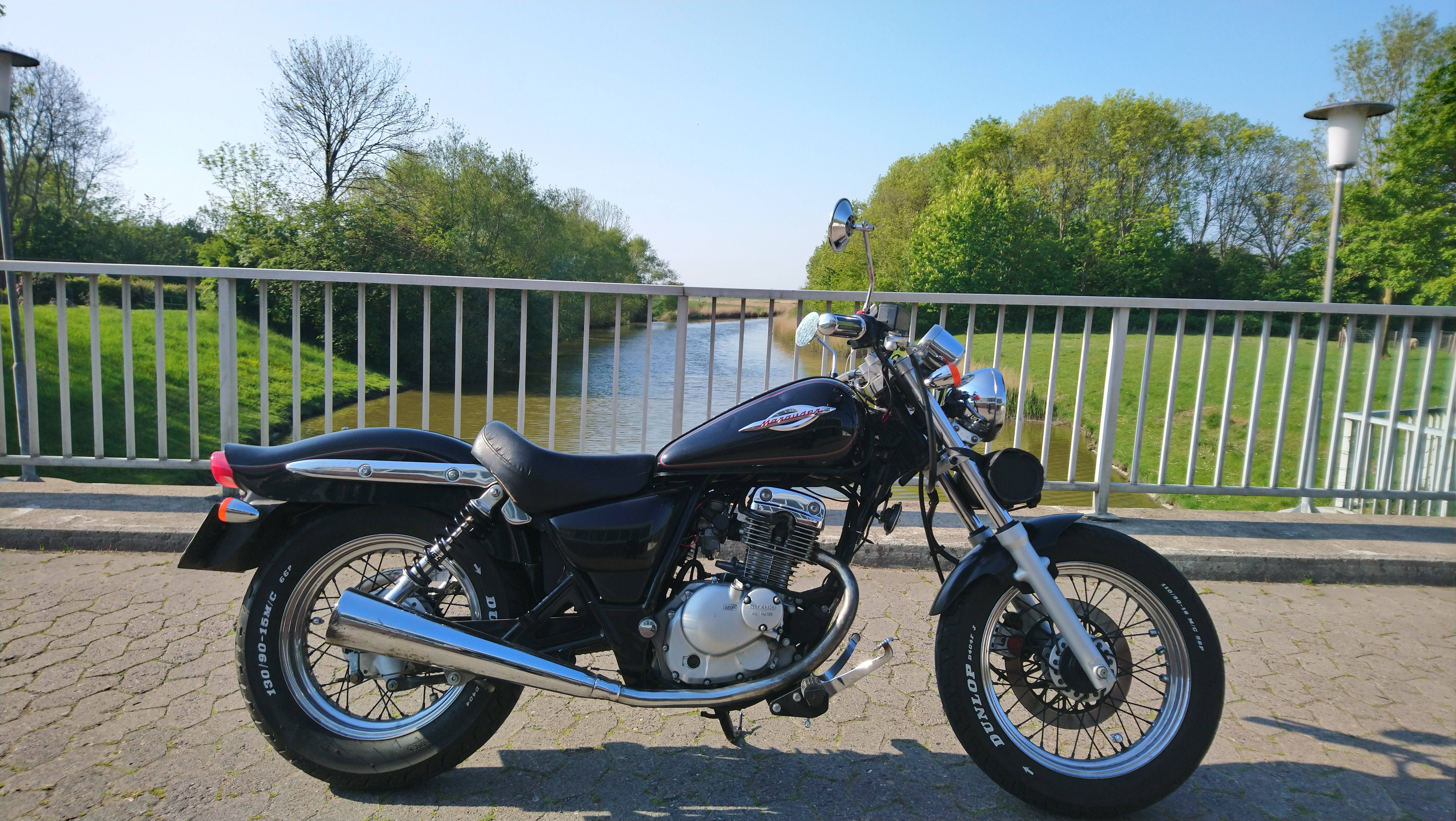 Revving Up Nostalgia: My 1998 Suzuki Marauder at the Car Meet