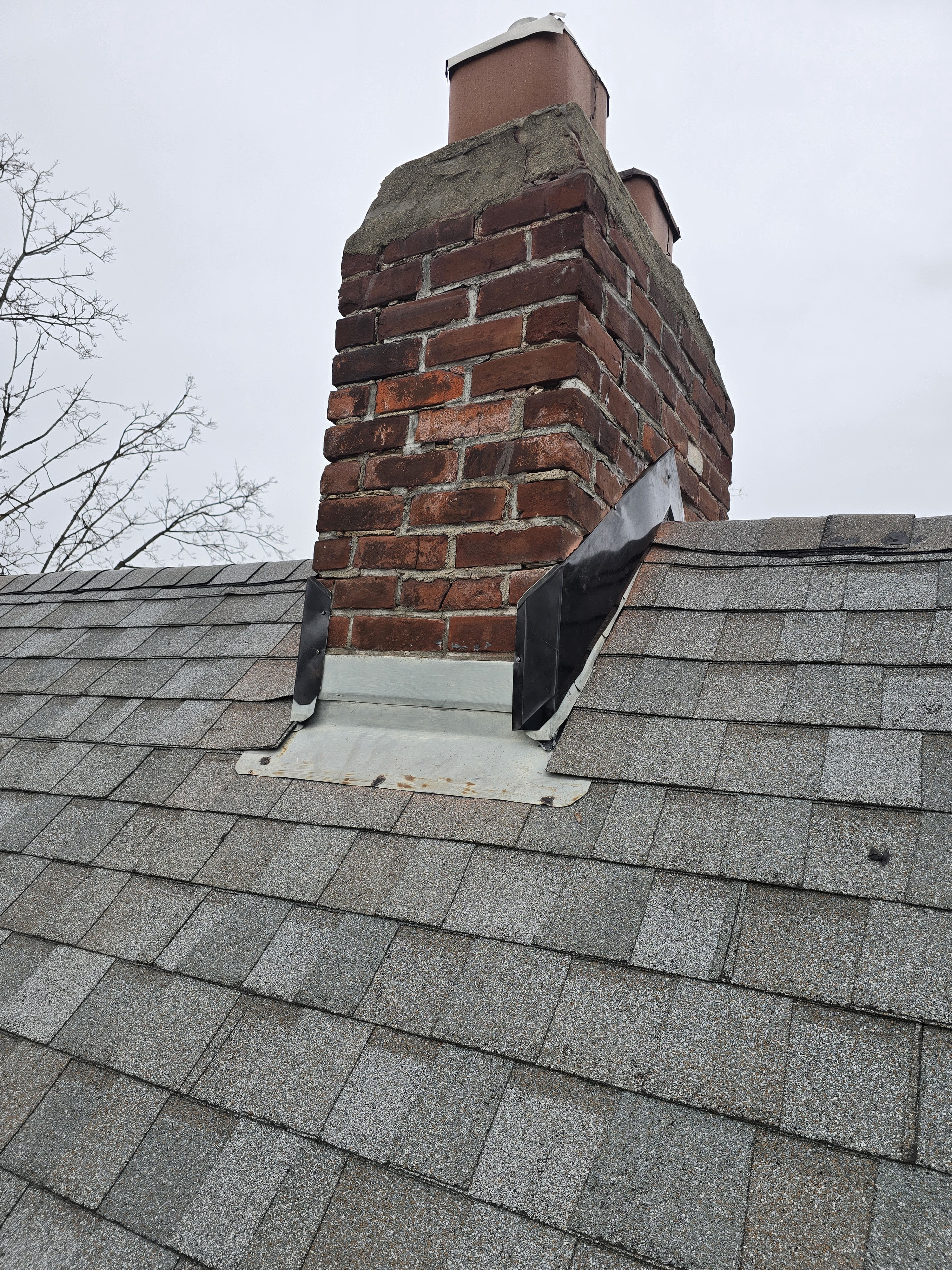 Is it okay to put new flashing over the old flashing?