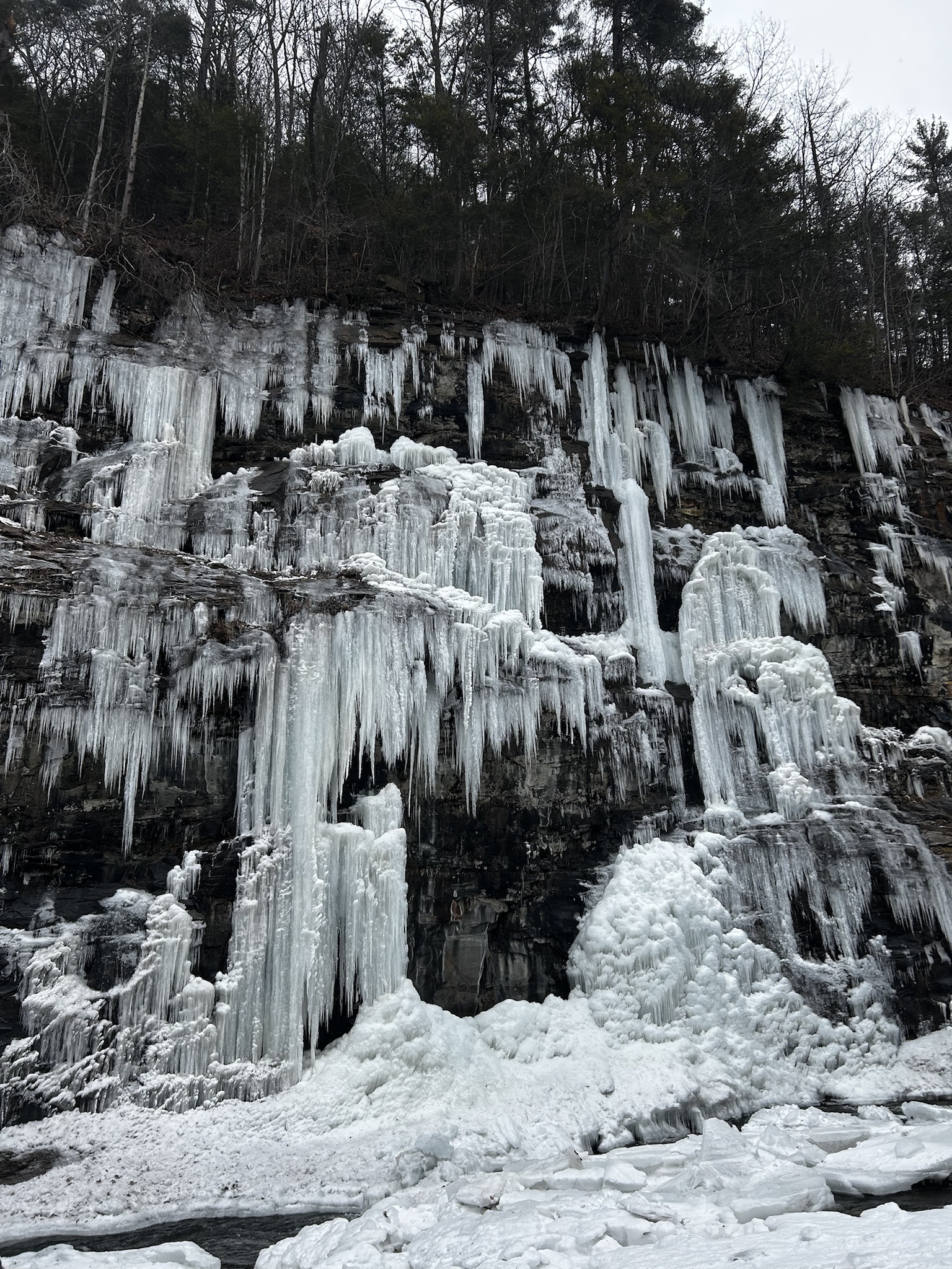 Embrace the serenity of winter waterfall therapy.