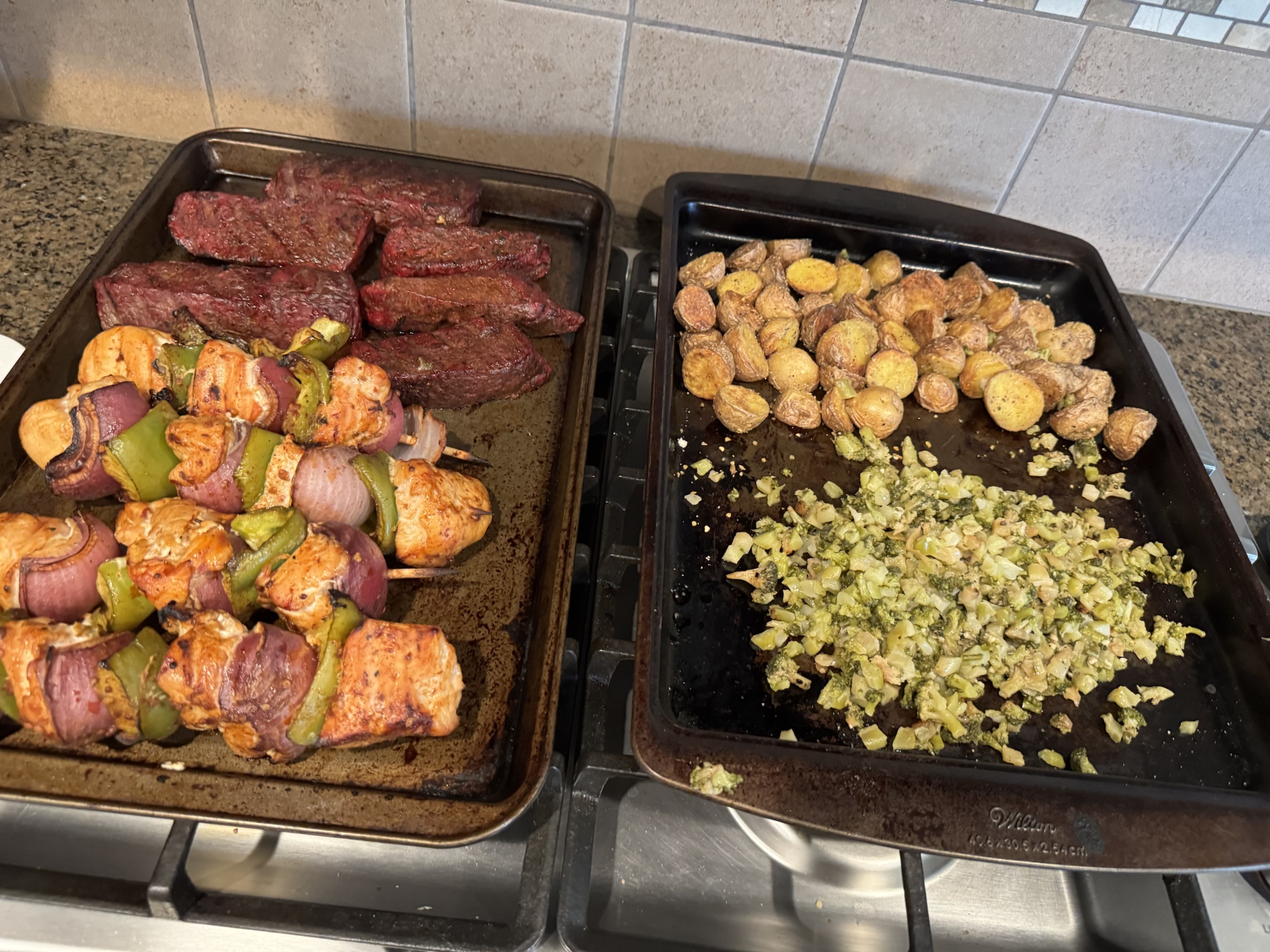 A Feast of Smoked Steaks, Chicken Kebabs, Crispy Potatoes, and Broccoli
