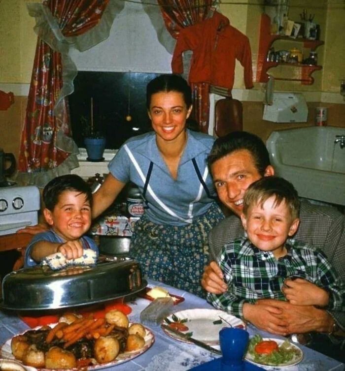 A family snapshot before a festive dinner in 1959