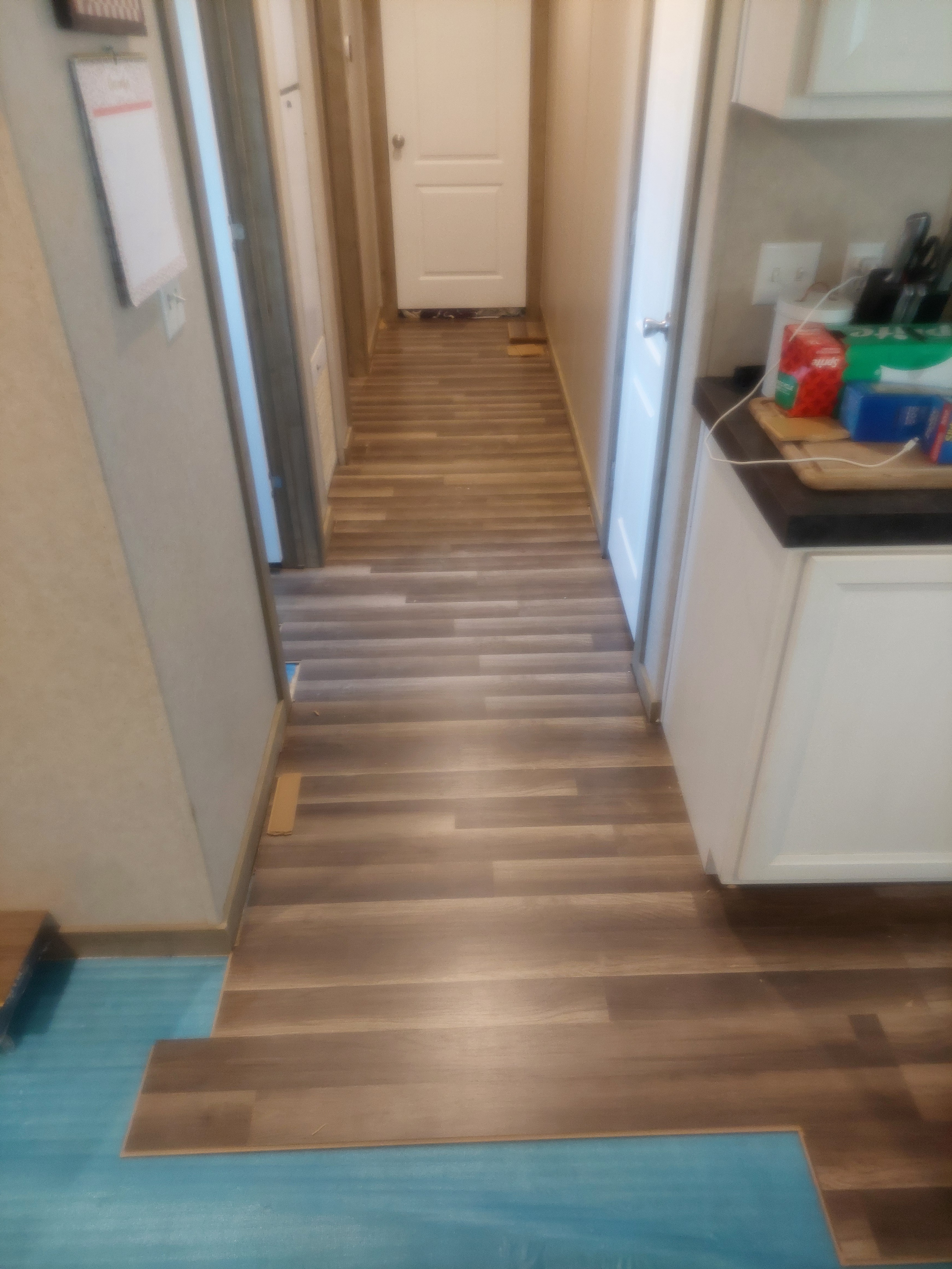 Check out these photos from the 'professional' floor replacement we splurged on.