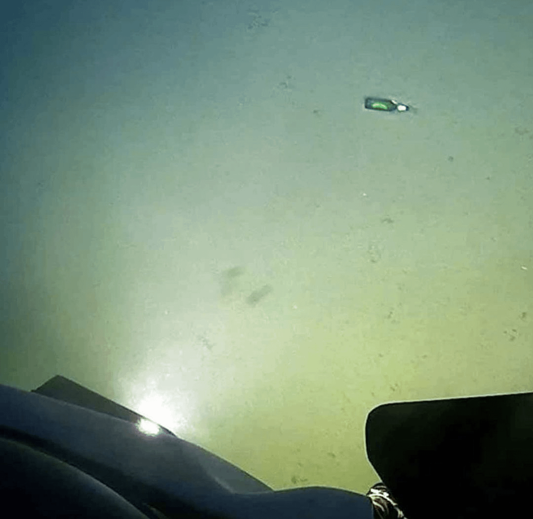 A beer bottle's journey to the depths of Challenger Deep