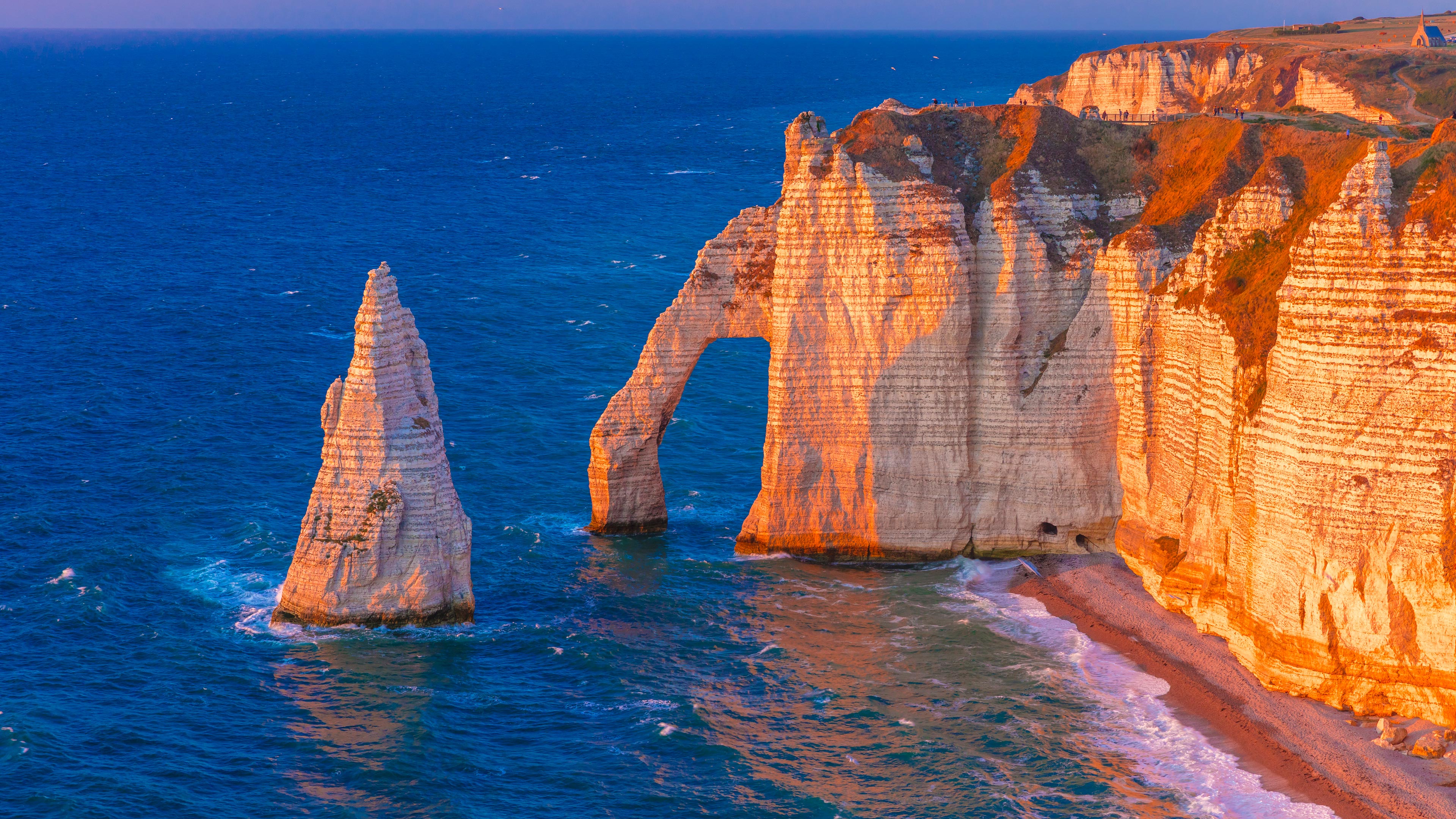 Vibrant Stripes Against the Serene Seashore