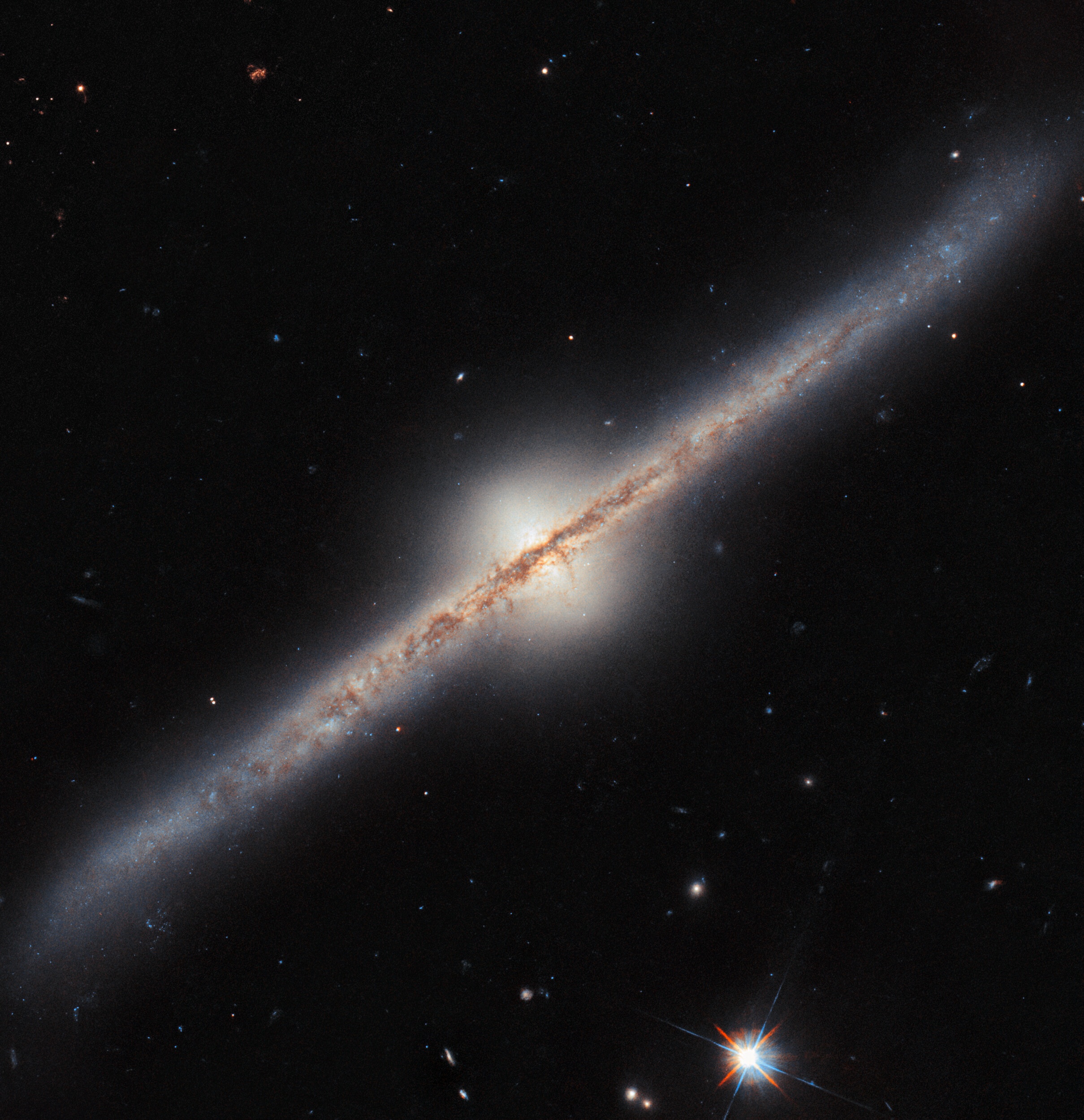Visualizing the Magnificent Central Bulge of UGC 10043 Spiral Galaxy: A Stunning Hubble Space Telescope Capture