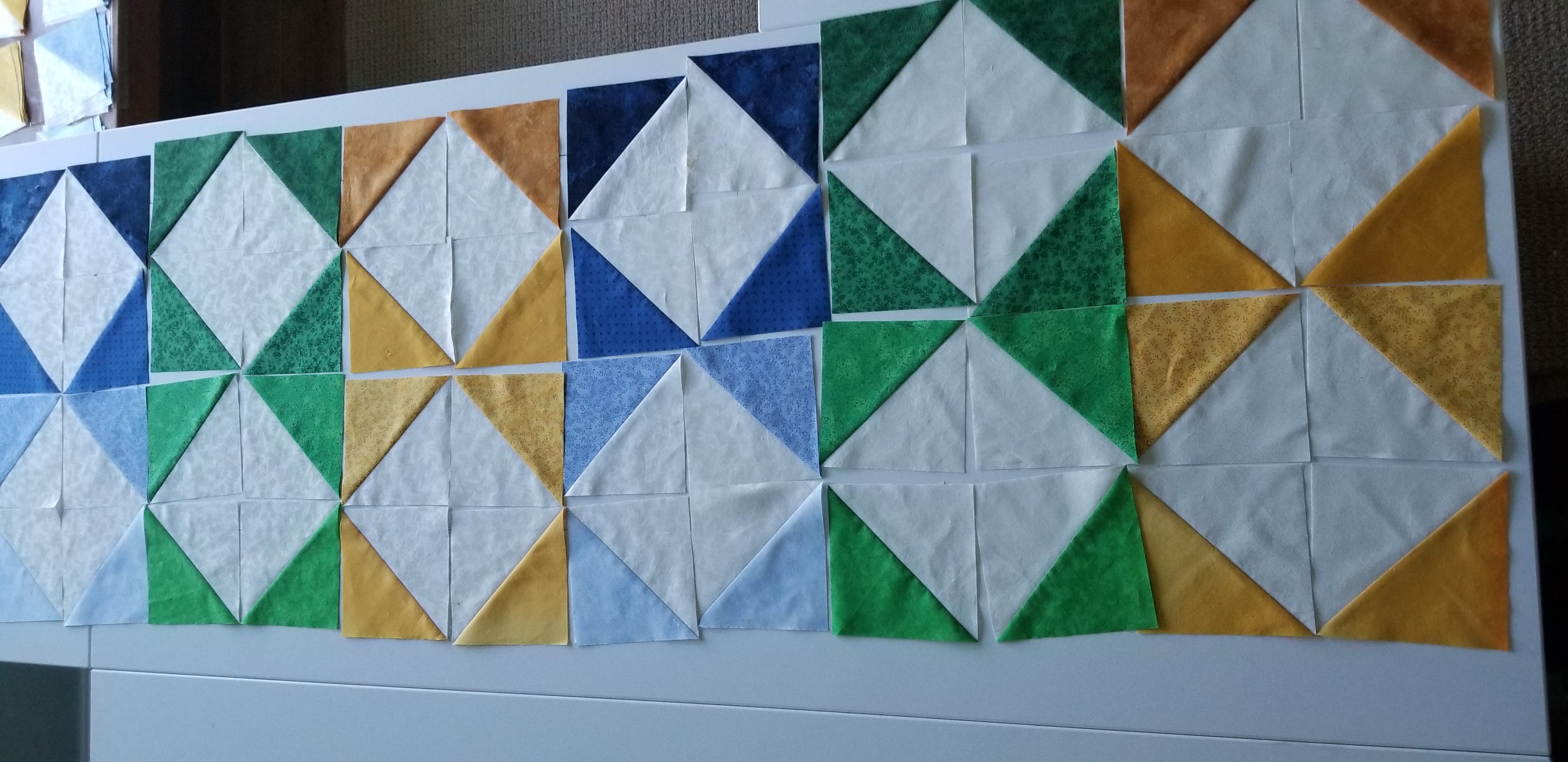 Seeking Opinions on My HST Quilt Layout Play