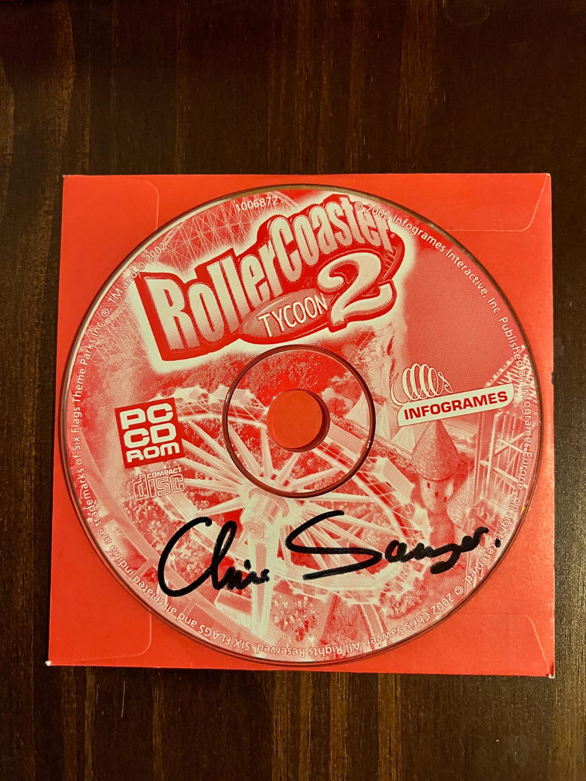 My coworker owns a signed copy of Roller Coaster Tycoon 2 by Chris Sawyer himself!