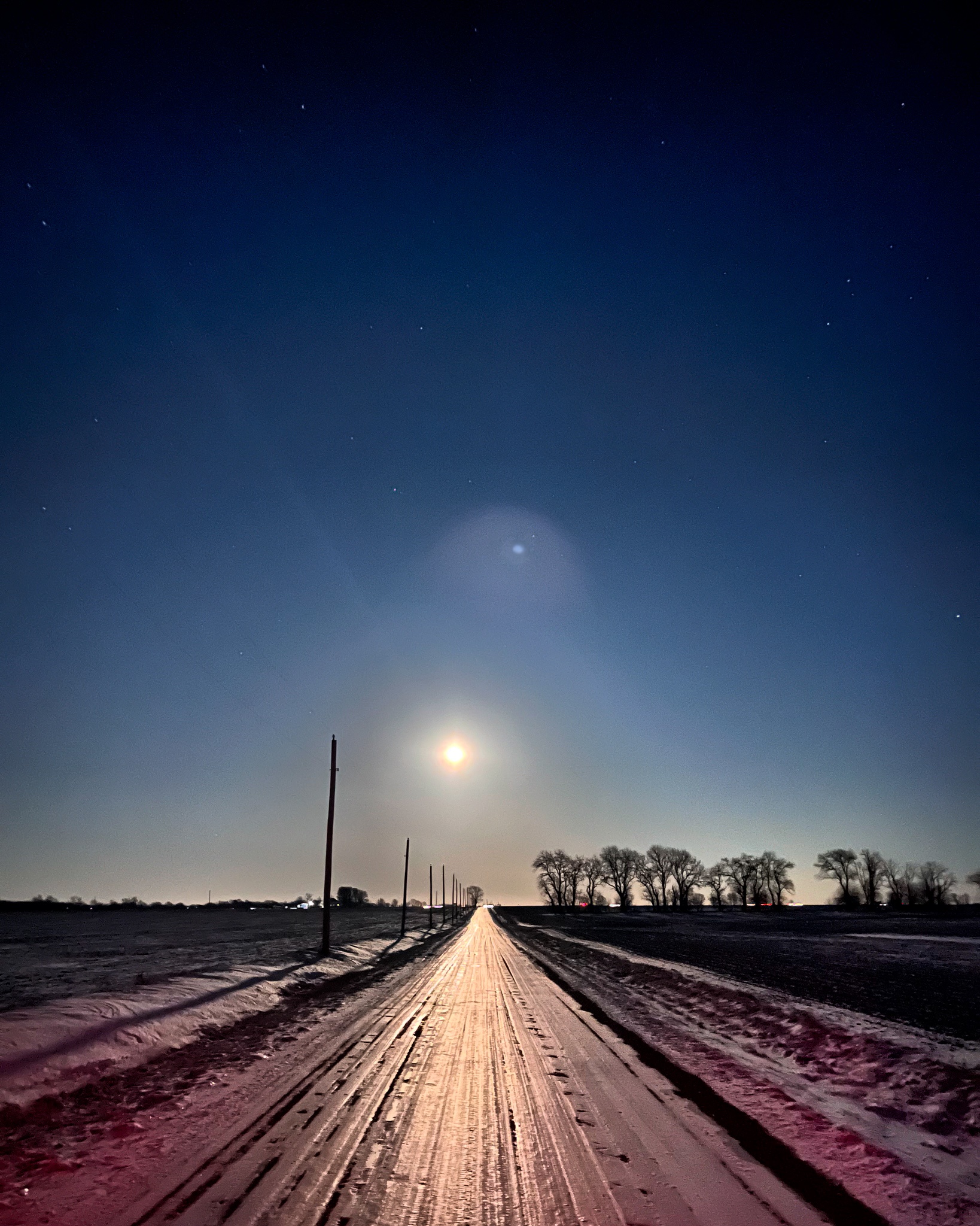 A Breathtaking Moonrise Over an Icy Illinois Road Last Night