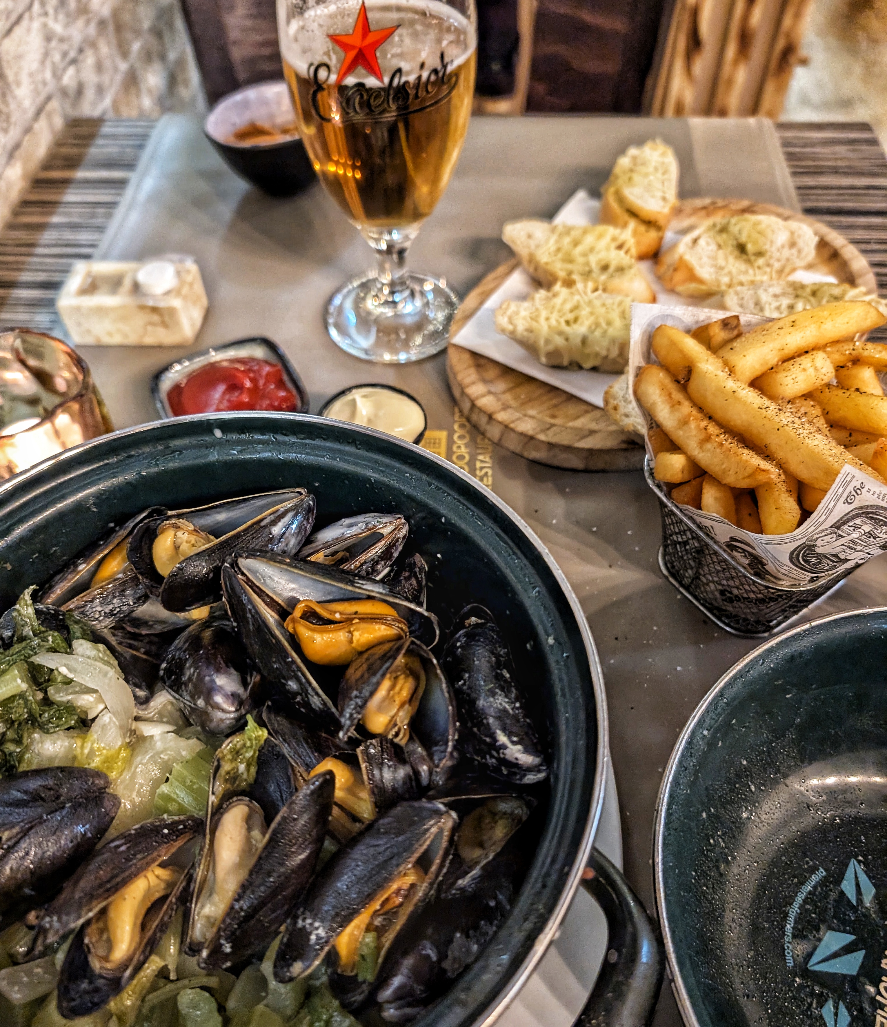 Savoring mussels in Brugge!