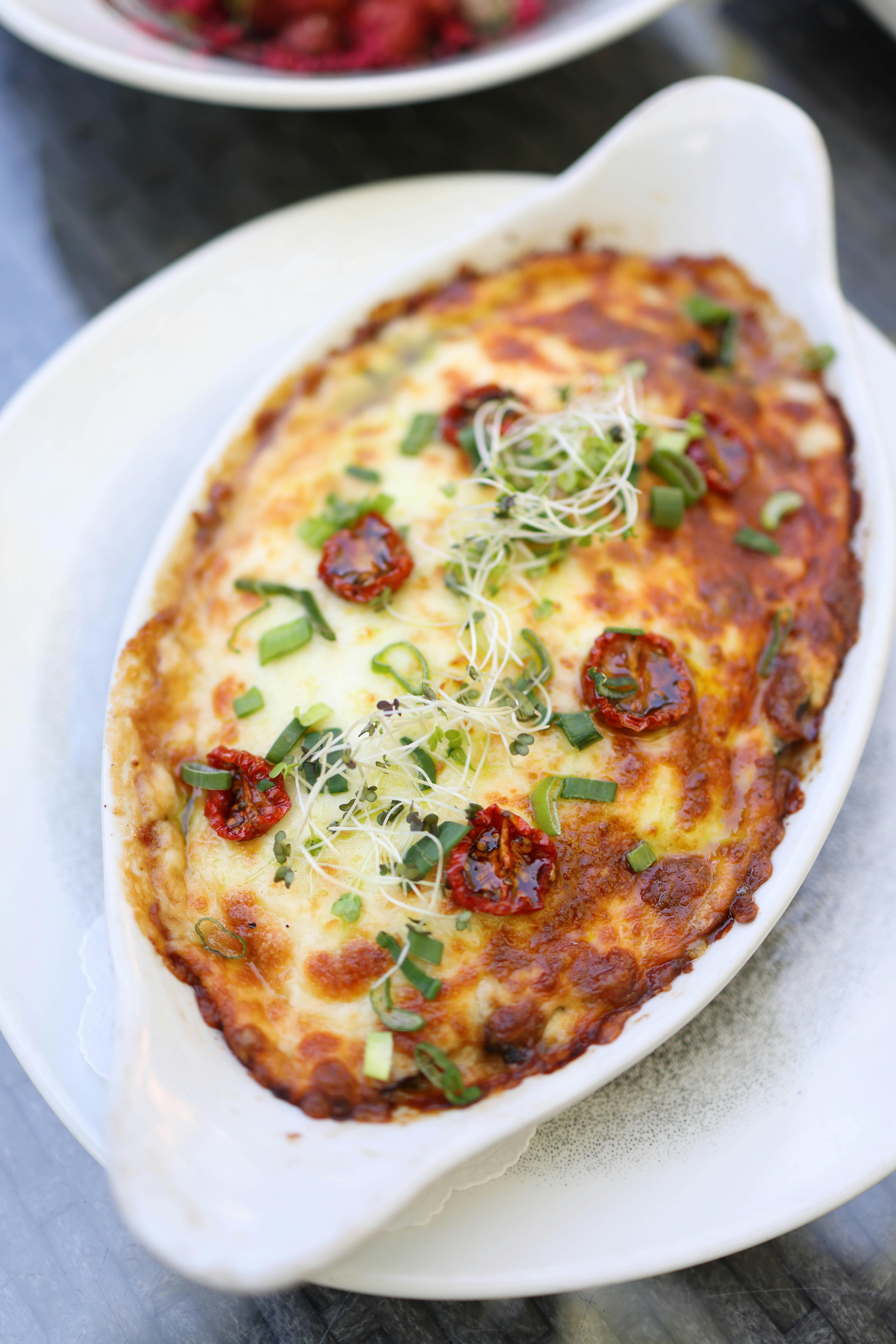 Deliciously Baked Eggs with Spinach and Cheese Delight
