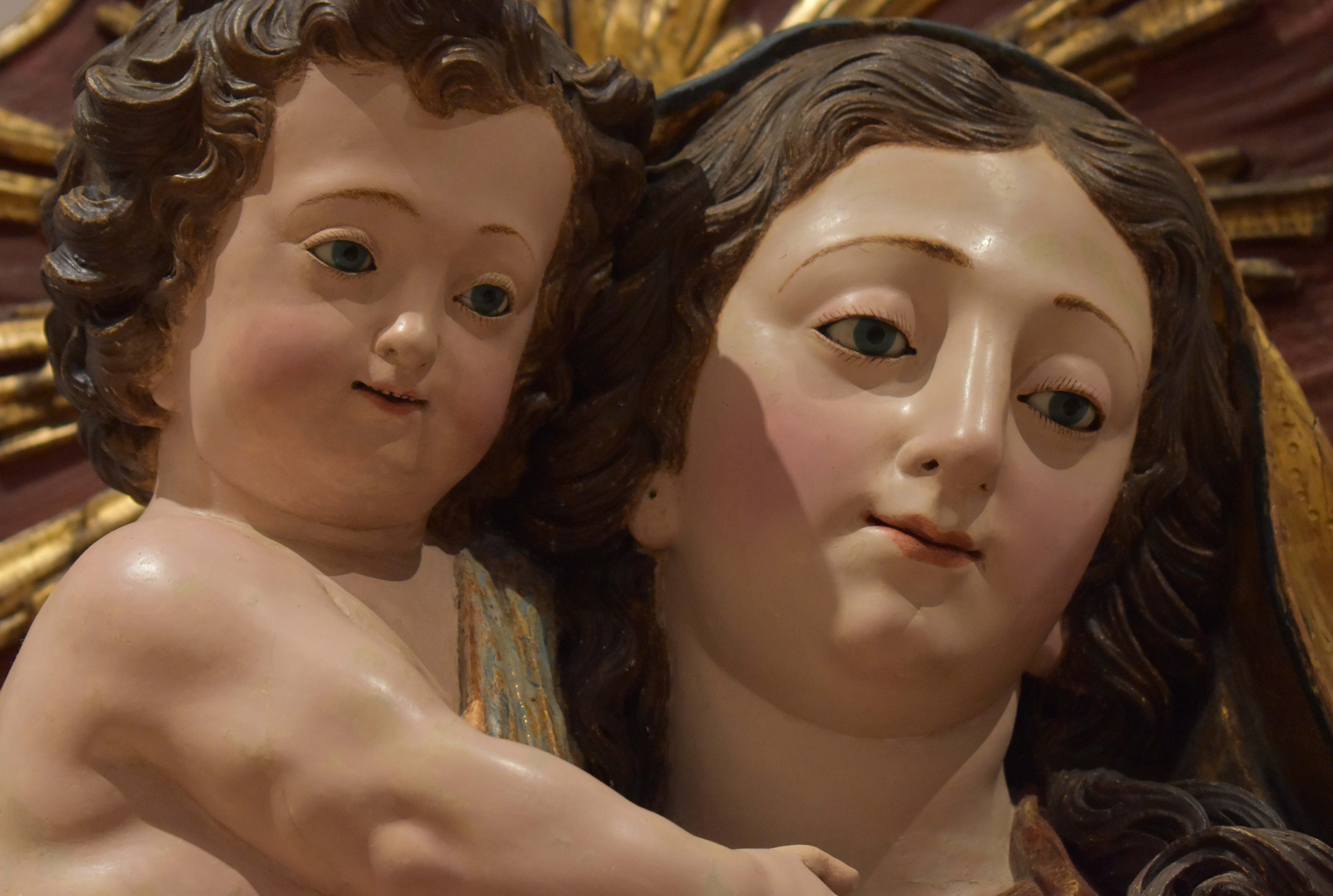 Virgin and Child with Saint John the Baptist: A Masterpiece