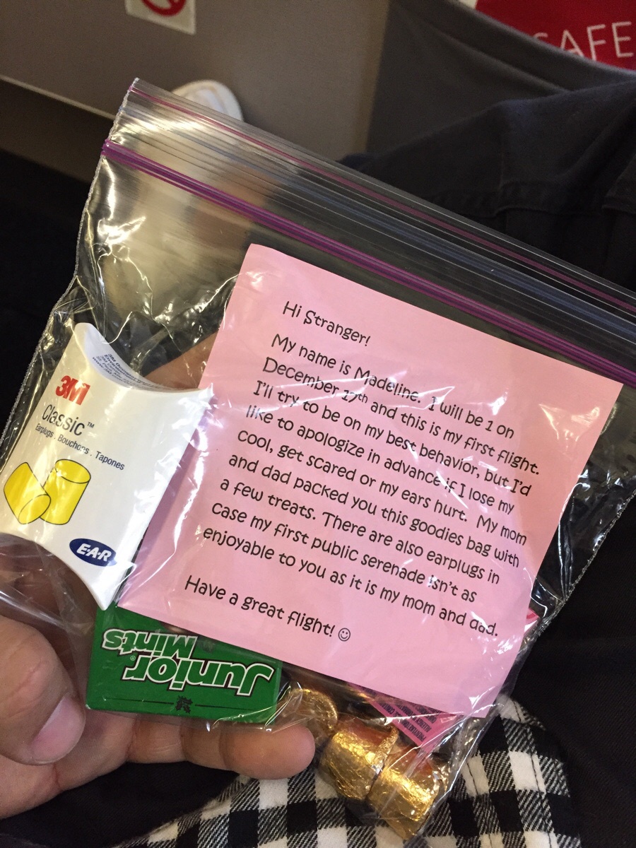 A baby just handed me this on my flight, and honestly, I can't be upset about it.