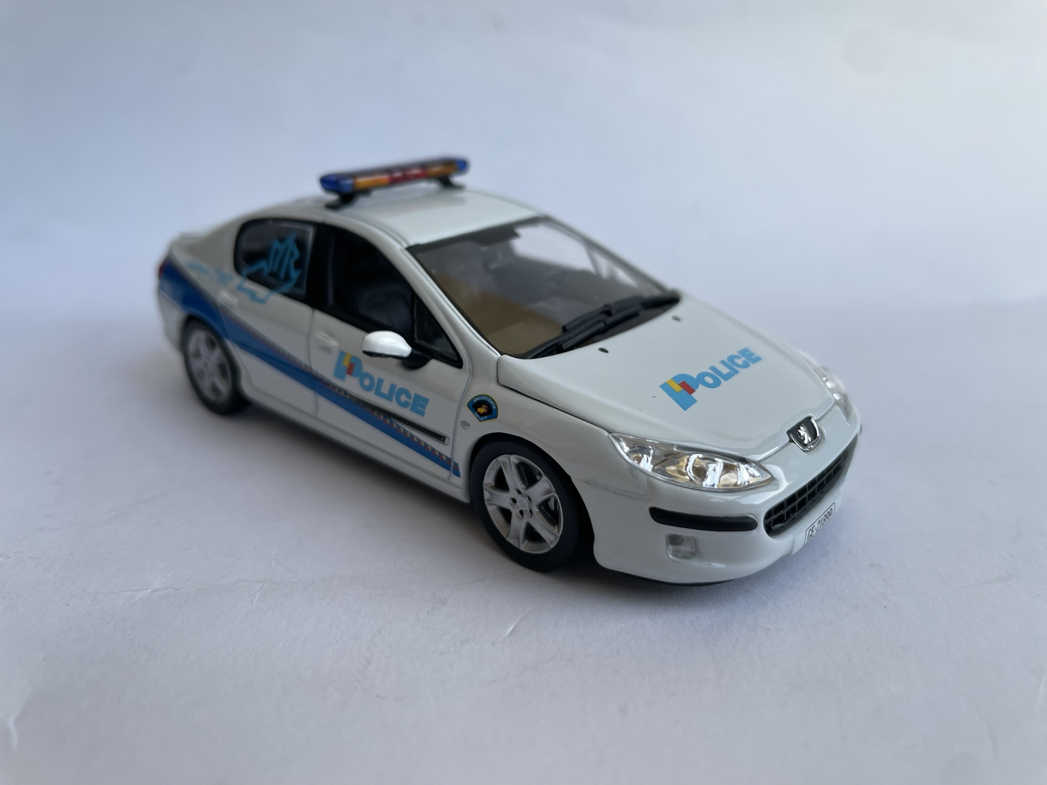 Peugeot 407 from Geneva's police force: Norev 1/43 model.