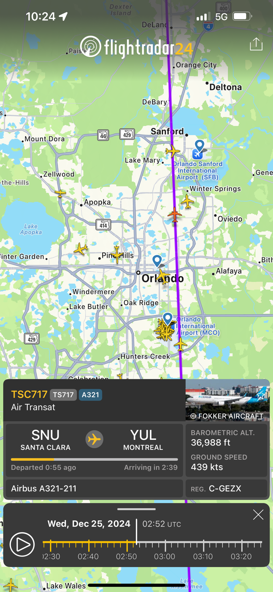 Flight TSC717 Cruising Over Orlando at 9:52 PM on Christmas Eve 2024