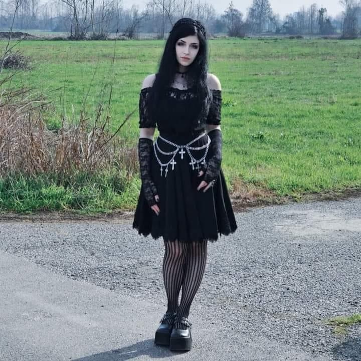 Admiring Her Fabulous Outfit