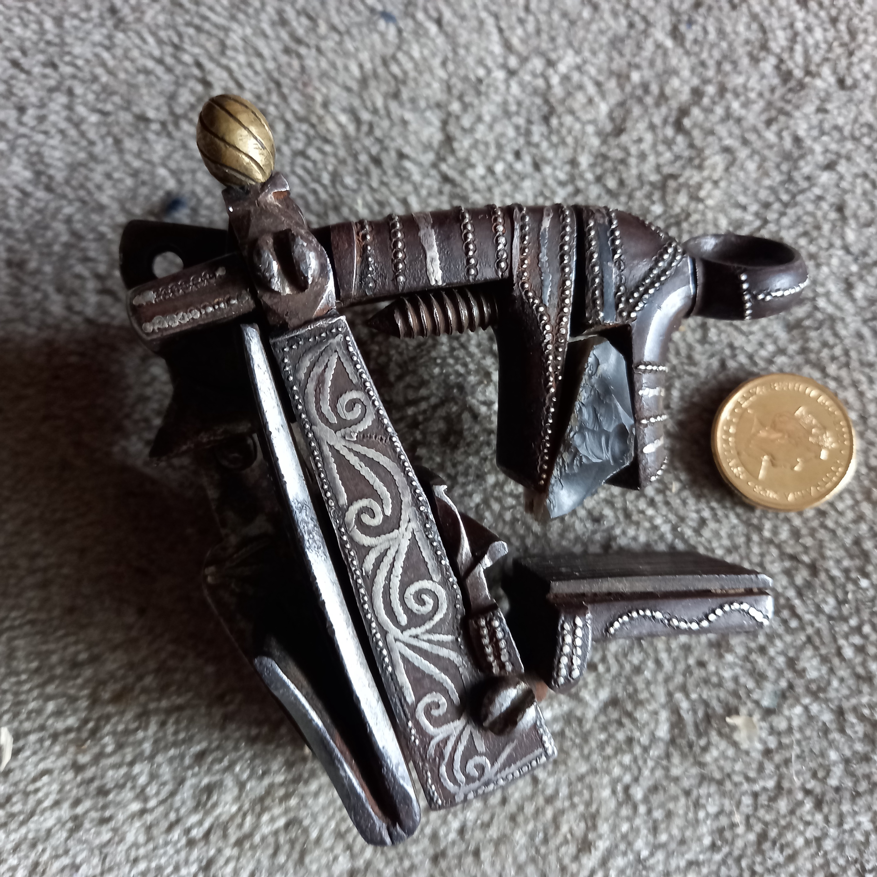 Can You Help Me Identify This Flintlock Hammer Mechanism?