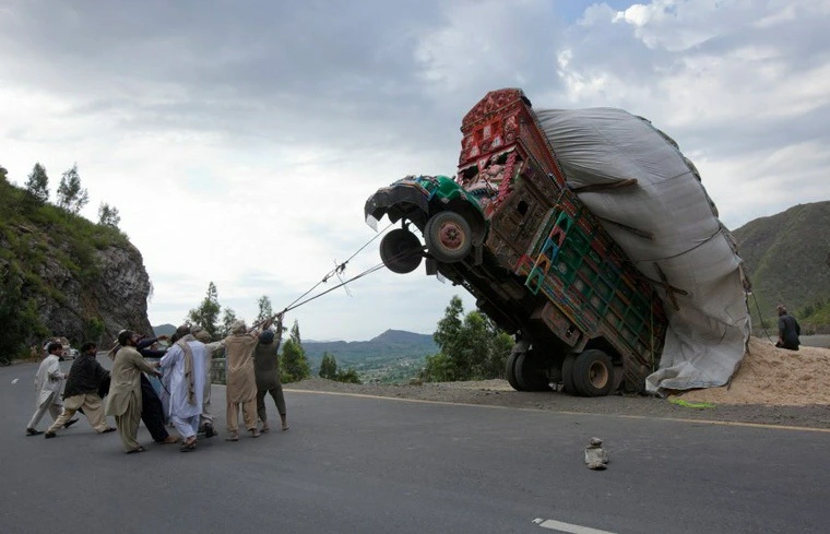 16th Favorite: Pakistani Hunters Taming a Wild Truck