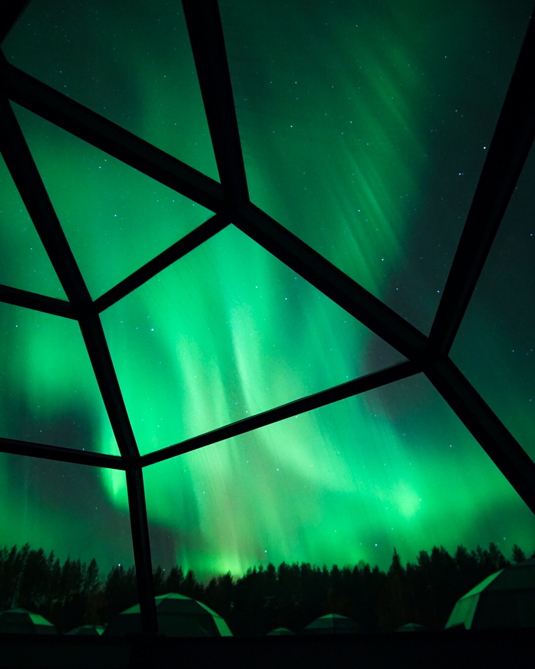 Witnessing the Northern Lights from a Glass Igloo on 10/24
