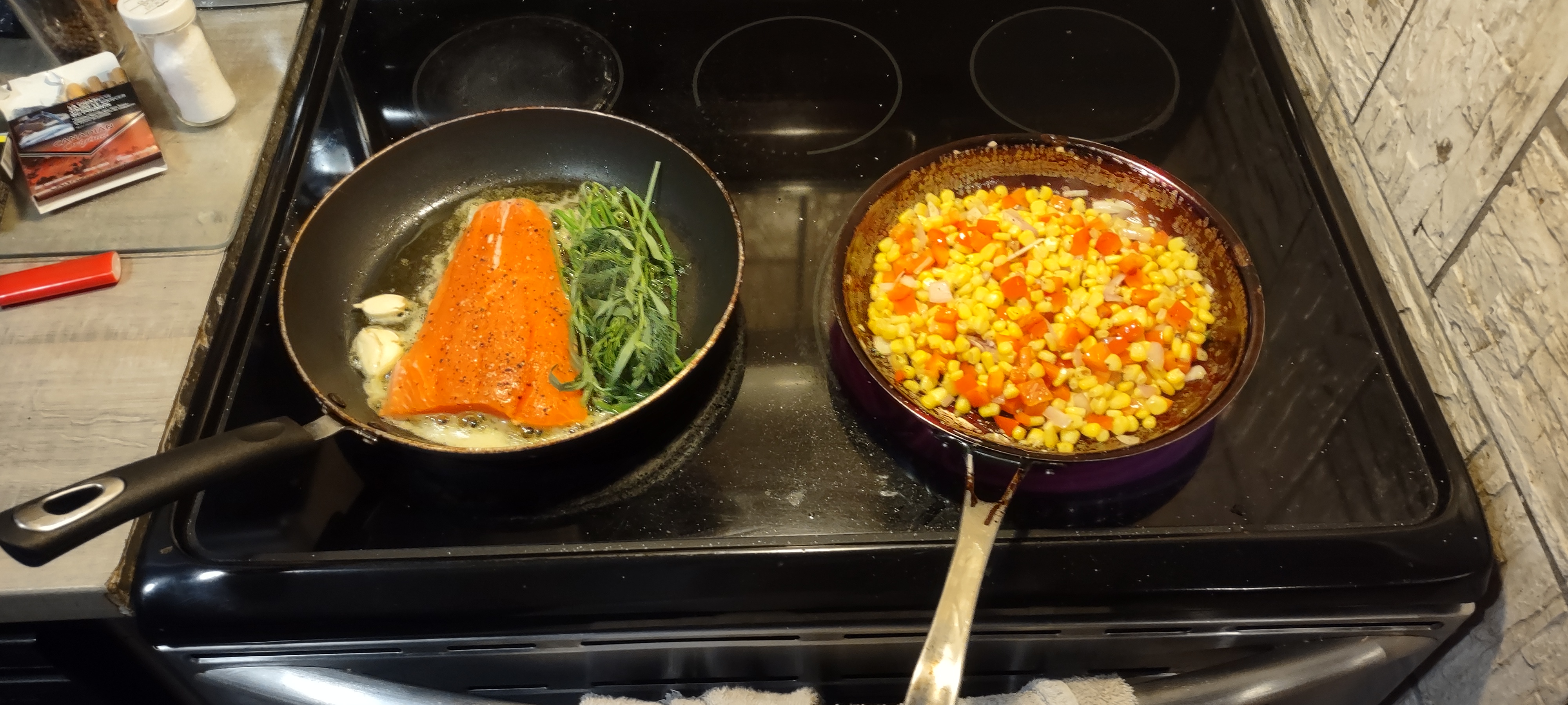 Indulge in crispy skin salmon paired with a delightful white wine succotash