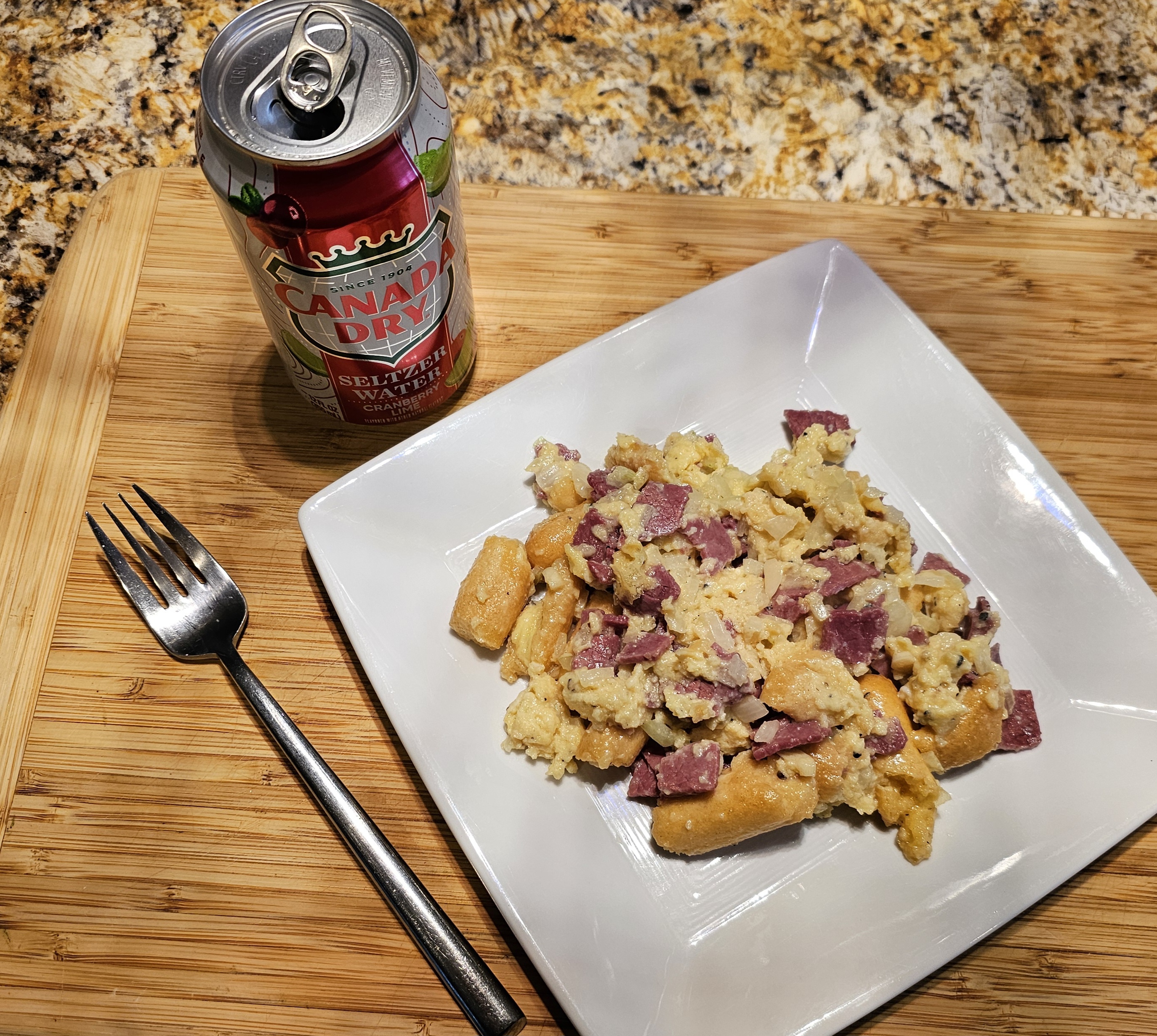 A Unique Breakfast: Scrambled Eggs with Corned Beef and Breadsticks?