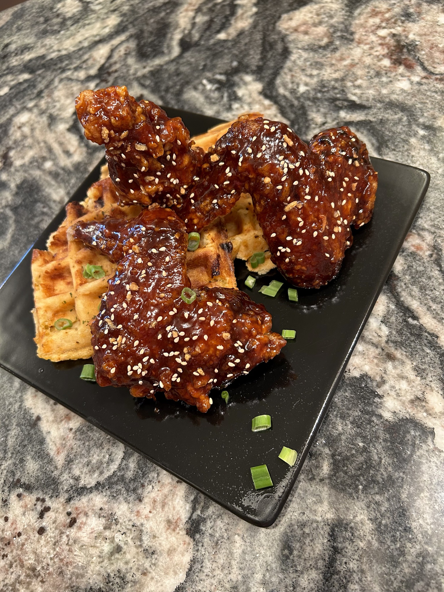 Delicious Fusion: Korean Fried Chicken Meets Cheddar Chili Waffles