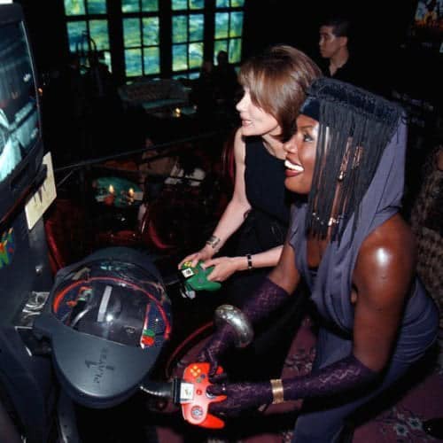 Maud Adams and Grace Jones reliving the GoldenEye 007 launch party on Nintendo 64!