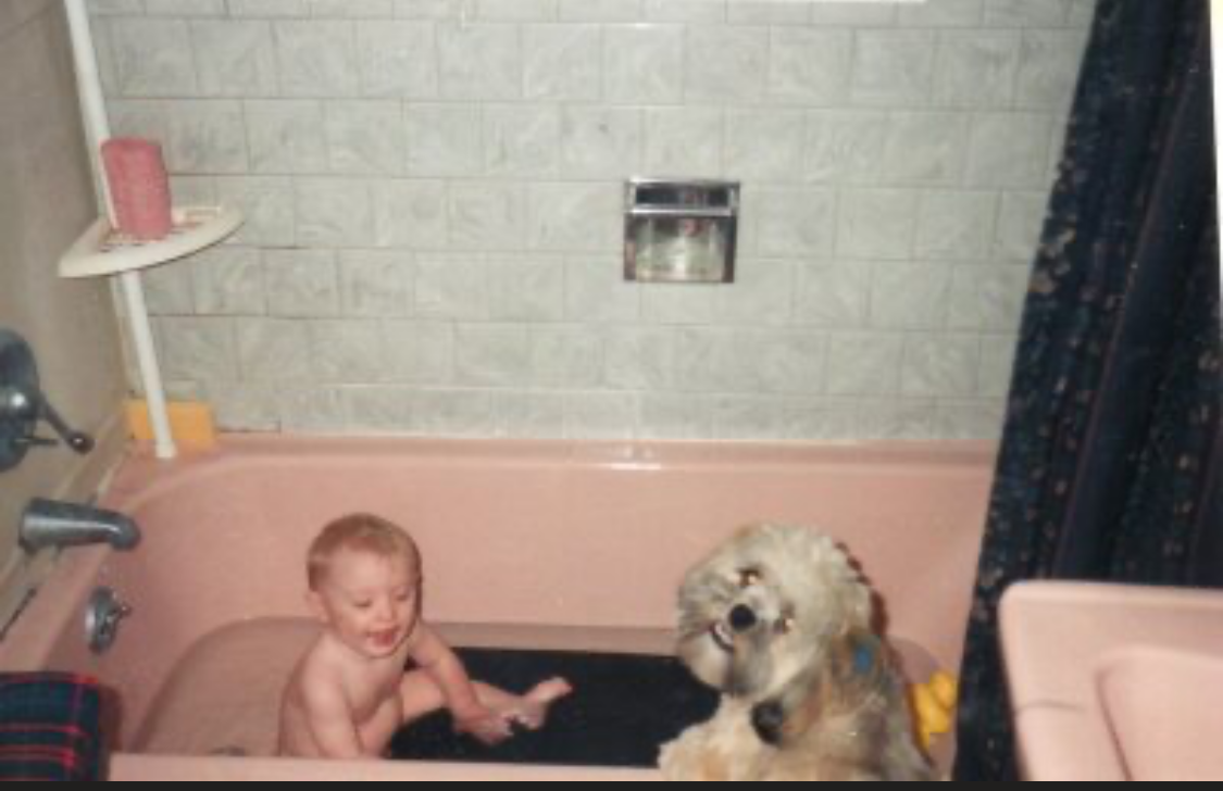 Came across this nostalgic photo of me with our beloved family dog, Banjo.